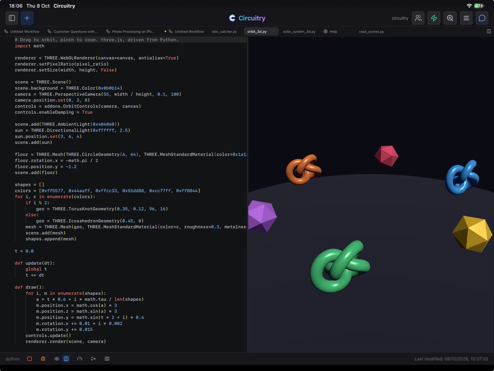 Python on an iPad: coloured knots and gems orbiting in a 3D preview beside the code that draws them